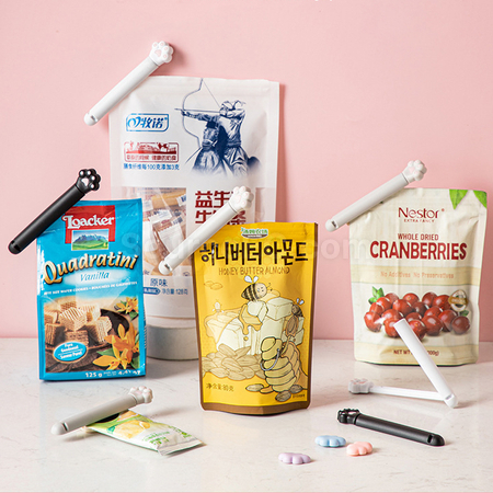 礼品订购猫爪零食封口夹广告