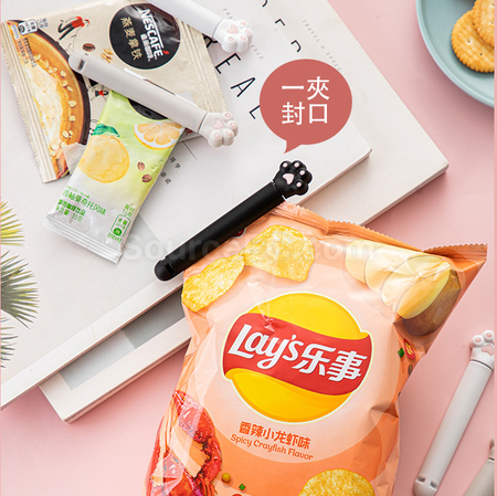 礼品订购猫爪零食封口夹广告