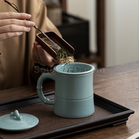 礼品订购陶瓷可过滤泡茶杯广告